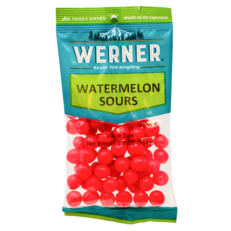 green and teal package of watermelon sours bright pink candies shown through a clear window