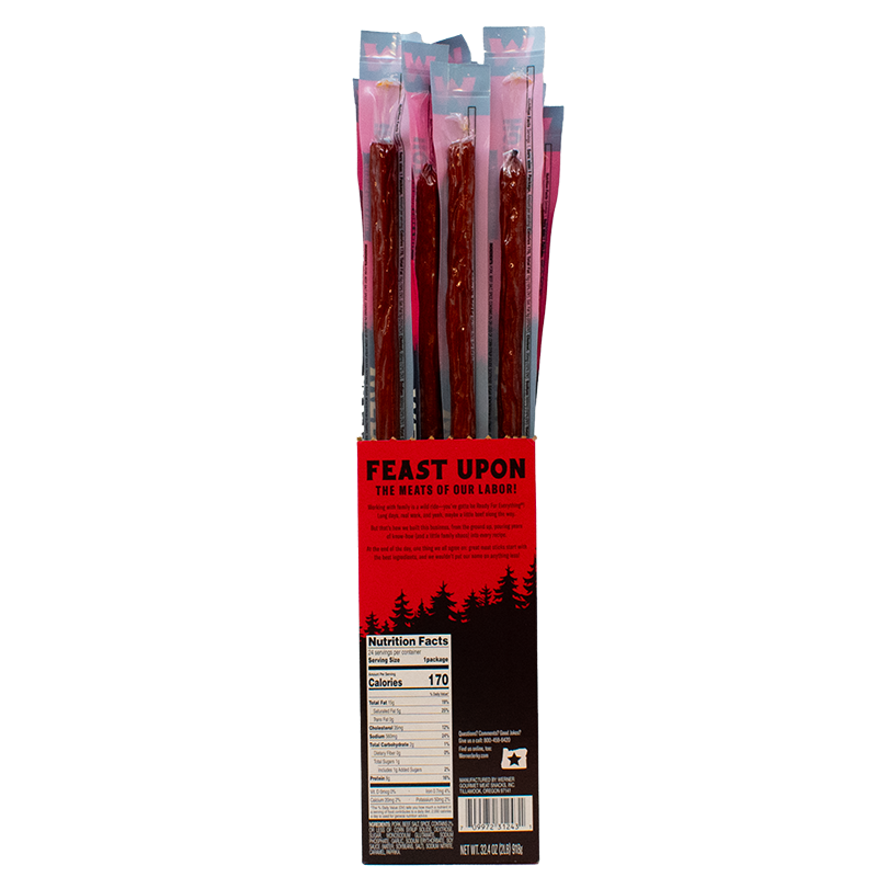 Packaged beef jerky sticks with 'Feast Upon' branding on a white background