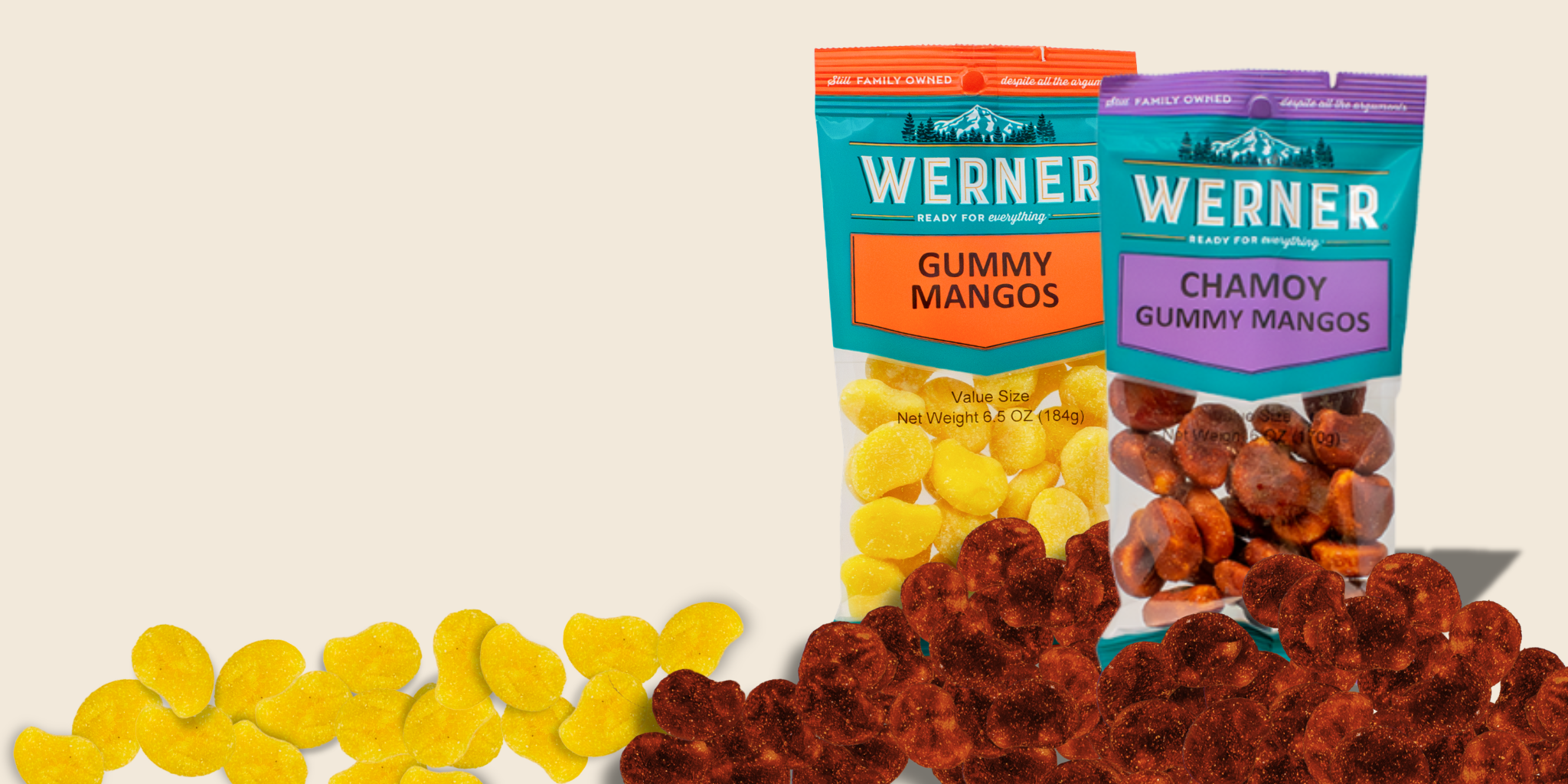 Two packages of Werner gummy mangoes on a beige background with scattered gummies.