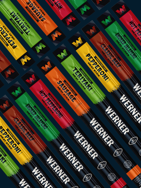 Assorted Werner brand meat sticks in various flavors on a black background