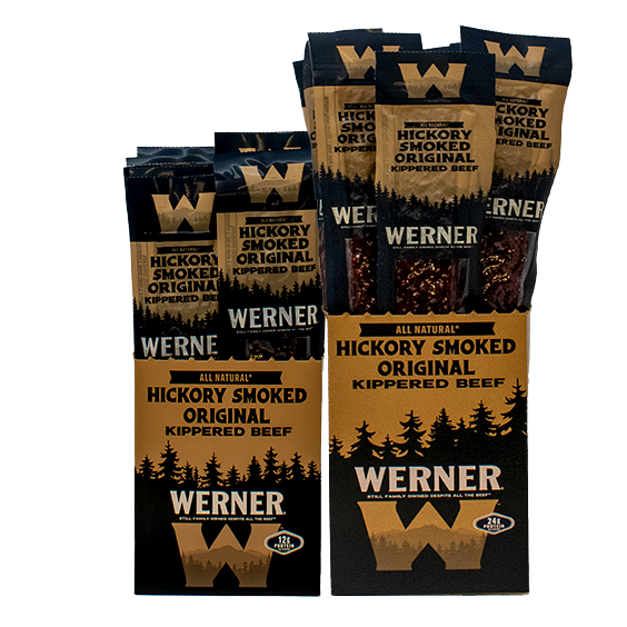 Multiple packages of Werner Hickory Smoked Original Kippered Beef on a white background